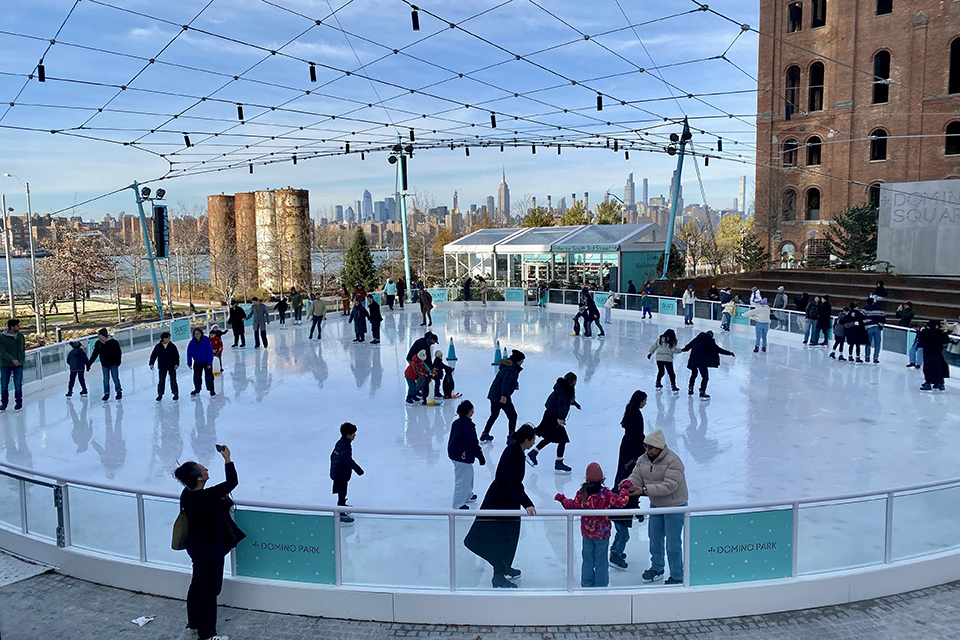 The Domino Square ice rink has a small footprint, but its big-city views are impressive.